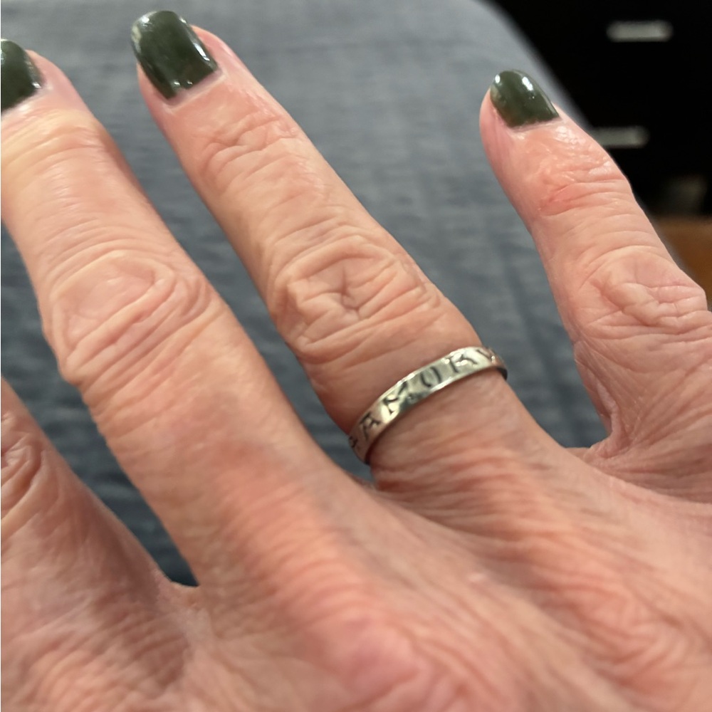 Vintage 925 Sterling Silver “Love Conquers All” Ring